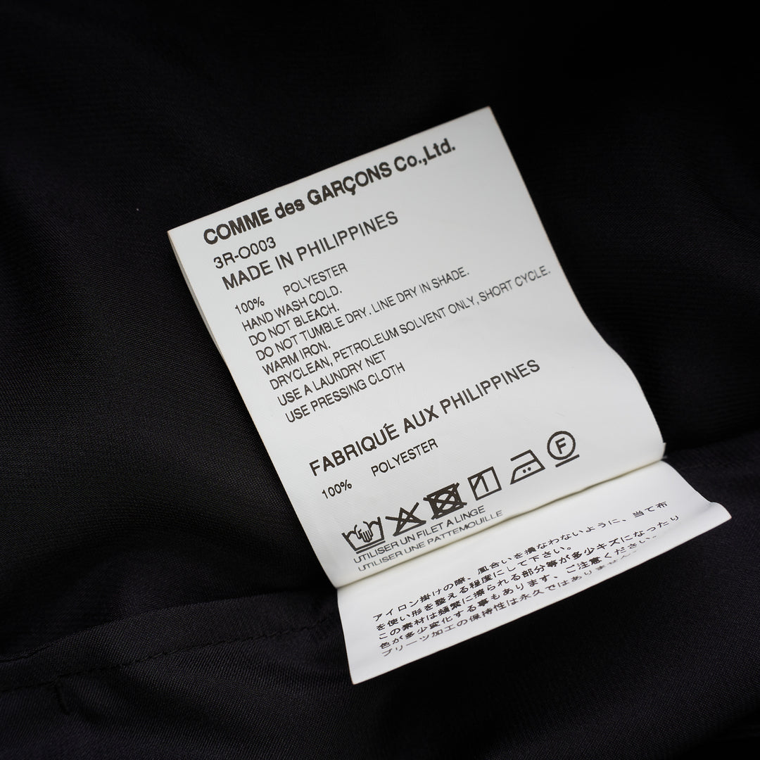 Black polyester satin midi dress with gathered neckline, puff cap sleeves and a pleated ruffle-trimmed tiered hem by Noir Kei Ninomiya - view 3