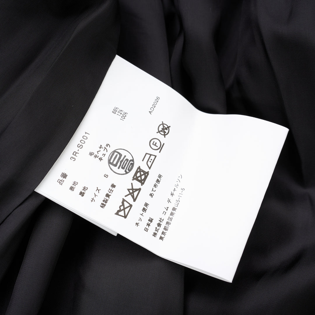 Noir Kei Ninomiya black wool doeskin midi skirt with an oversized sculptural bow, gathered elastic waist and bubble hem - view 3