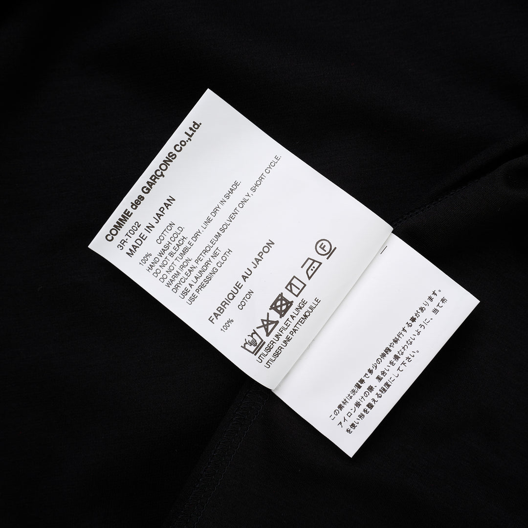 Noir Kei Ninomiya black cotton ponte tee with crew neck and twisted knot detailing on both short sleeves, shown from the front - view 5