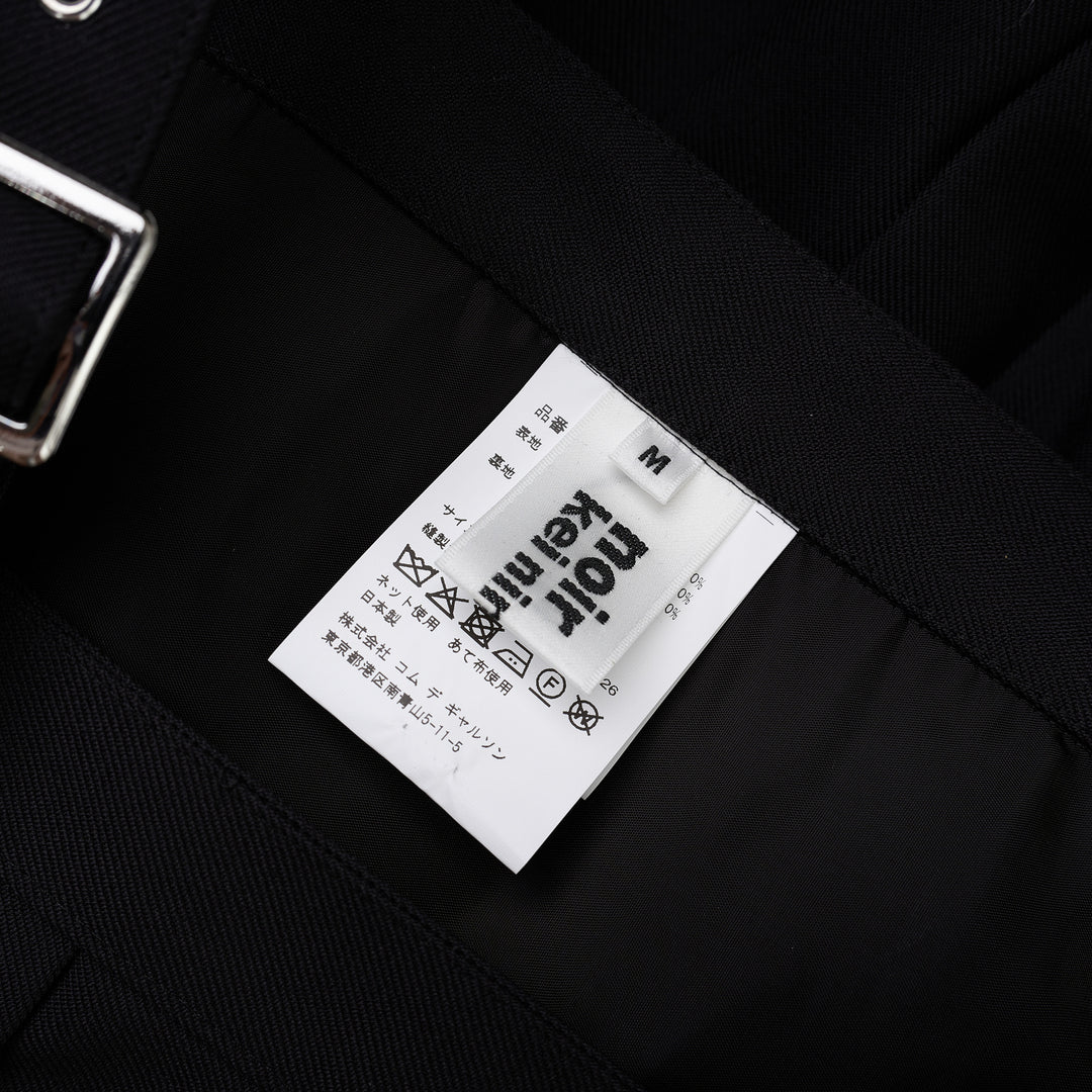 Noir Kei Ninomiya black pleated vest in wool polyester gabardine with grommet-studded buckle straps and layered peplum - view 3