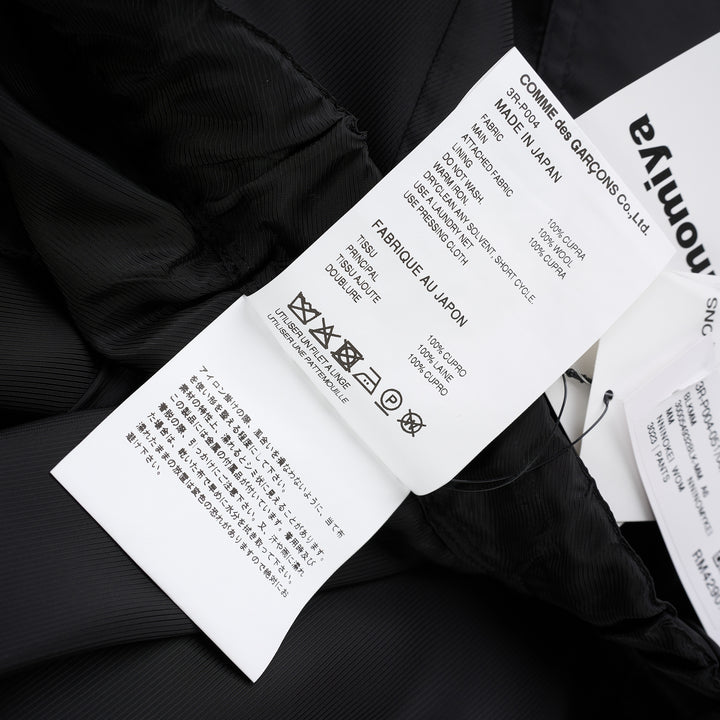 Noir Kei Ninomiya black wide-leg pants in cupra twill and wool gabardine with elasticated waist and layered tailored lower section - view 5