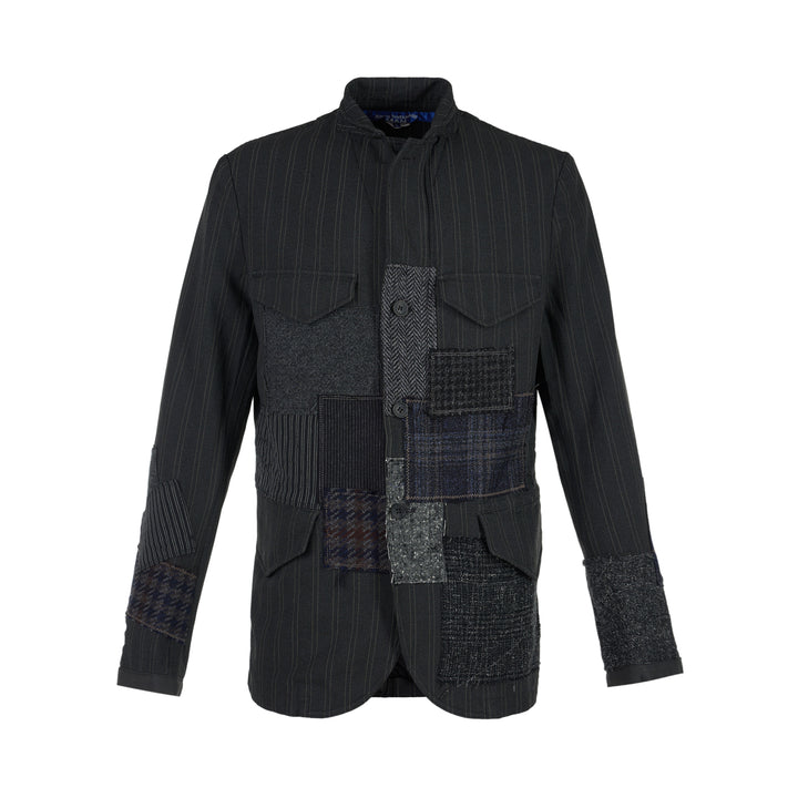 Junya Watanabe MAN charcoal pinstripe jacket with mixed wool patchwork panels, stand collar and flap pockets, front view