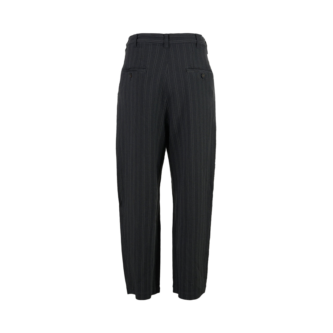 Junya Watanabe charcoal pinstripe wide-leg pants with front pleat and button closure, shown from the front - view 2