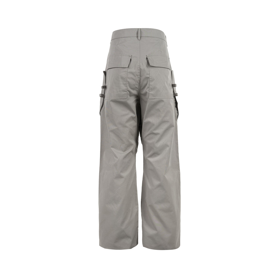 Rick Owens Stefan cargo pants in a grey cotton-nylon ripstop with oversized flap pockets and a wide-leg silhouette, shown from the front - view 2