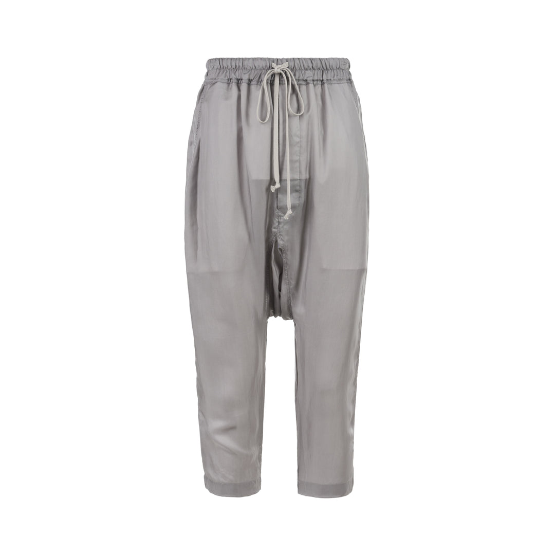 Rick Owens grey drawstring cropped pants with a dropped crotch, elasticated waistband and fluid, semi-sheer fabric, shown from the front