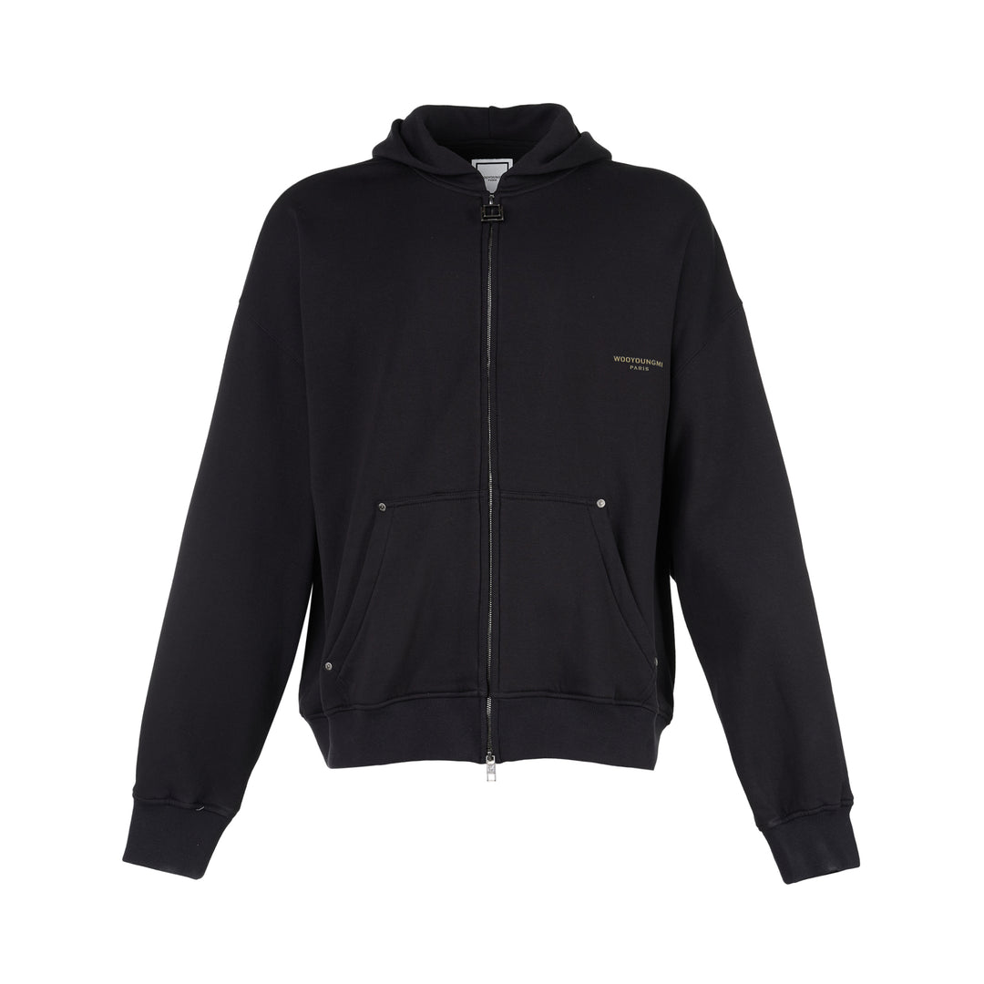 Black Wooyoungmi zip-up hoodie with padlock-style zip pull, stud-detailed kangaroo pockets and small gold logo on the chest