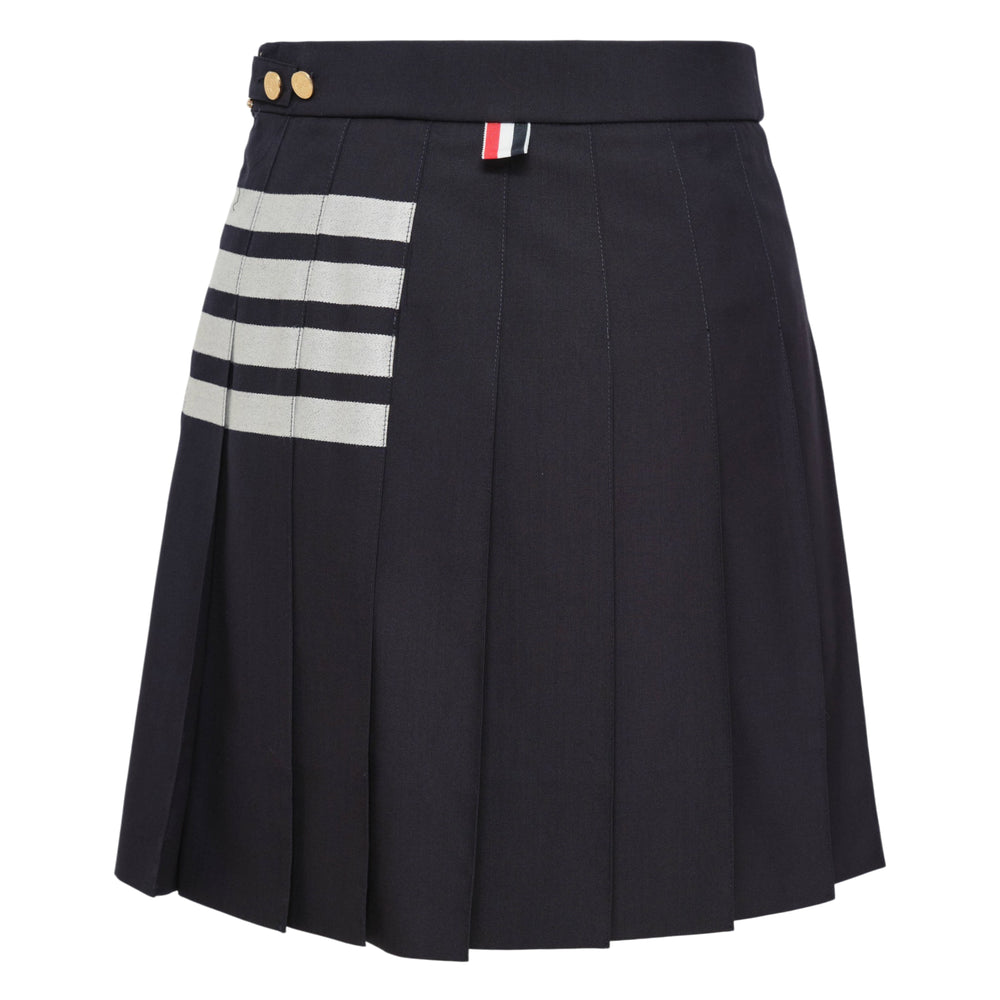 Thom Browne Mini Dropped Back Pleated Skirt in medium grey with white 4-bar stripes and grosgrain ribbon trim