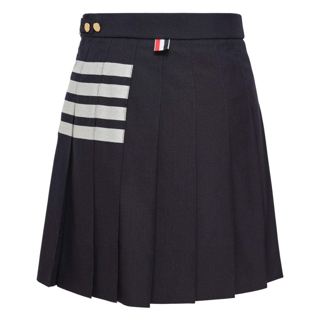 Thom Browne Mini Dropped Back Pleated Skirt in medium grey with white 4-bar stripes and grosgrain ribbon trim