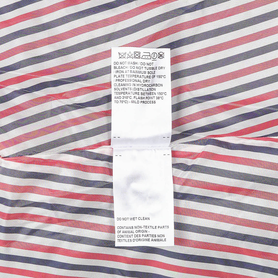 Thom Browne Mini Dropped Back Pleated Skirt in medium grey with white 4-bar stripes and grosgrain ribbon trim