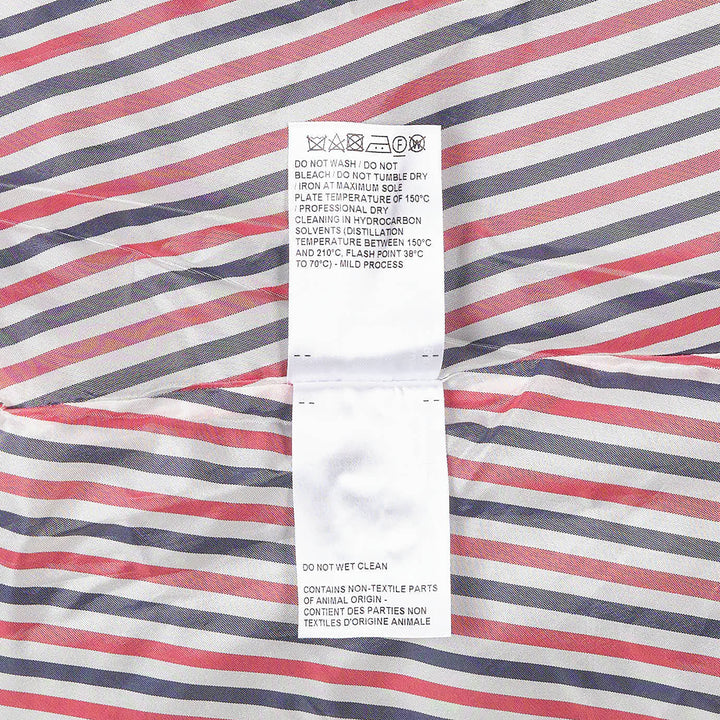 Thom Browne Mini Dropped Back Pleated Skirt in medium grey with white 4-bar stripes and grosgrain ribbon trim