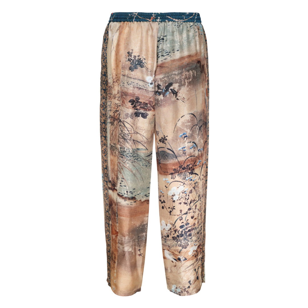 Pierre-Louis Mascia Aloe printed trousers with an artistic East Asian-inspired landscape print featuring birds, florals, and botanical motifs on warm sand and terracotta tones, with a teal elasticated drawstring waistband - view 2