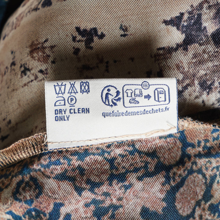 Pierre-Louis Mascia Aloe printed trousers with an artistic East Asian-inspired landscape print featuring birds, florals, and botanical motifs on warm sand and terracotta tones, with a teal elasticated drawstring waistband - view 4