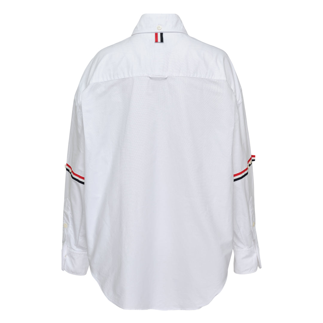 Thom Browne Supersized Point Collar Shirt in white Oxford cotton with RWB grosgrain armband stripe and button-down collar, front view