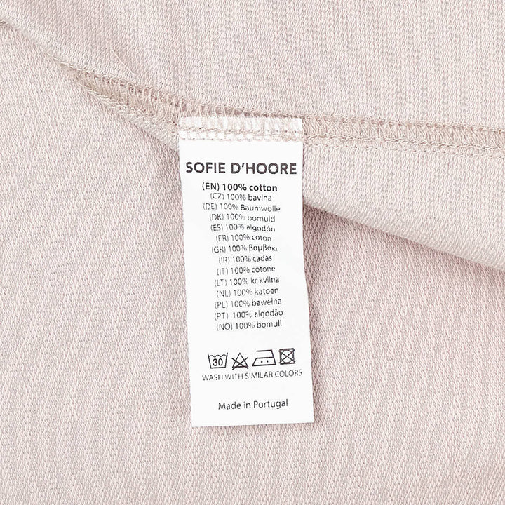 Sofie D'Hoore short sleeve boxy tee in dusty rose with ribbed crew neck and topstitched hem, displayed flat on white background