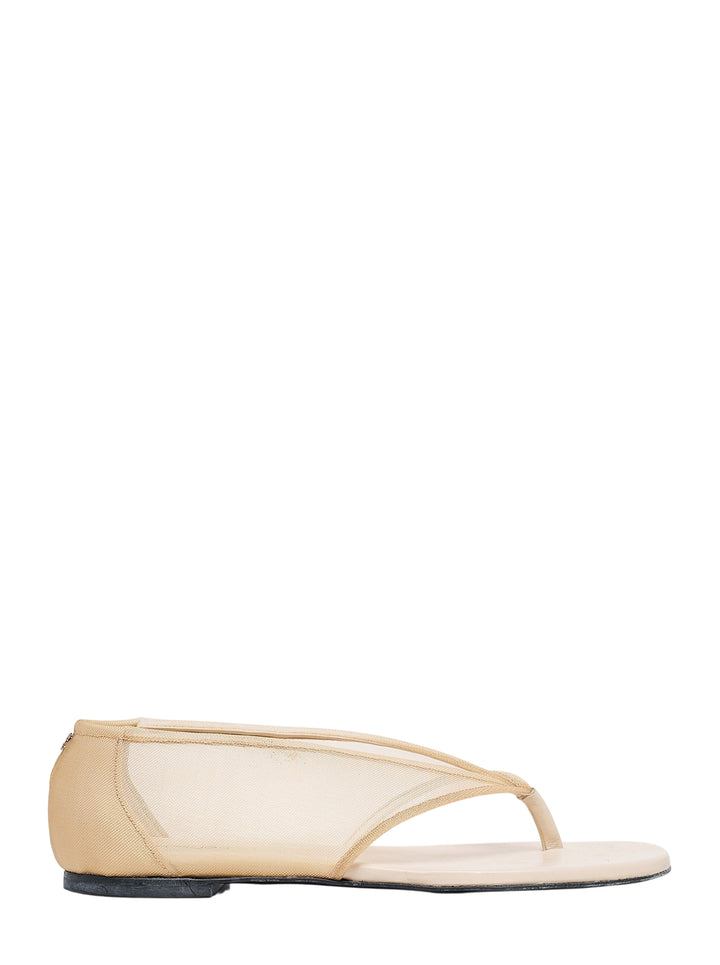 Courrèges wrapped mesh thong sandal in nude with sheer mesh upper, leather thong strap and flat sole, shown in side profile