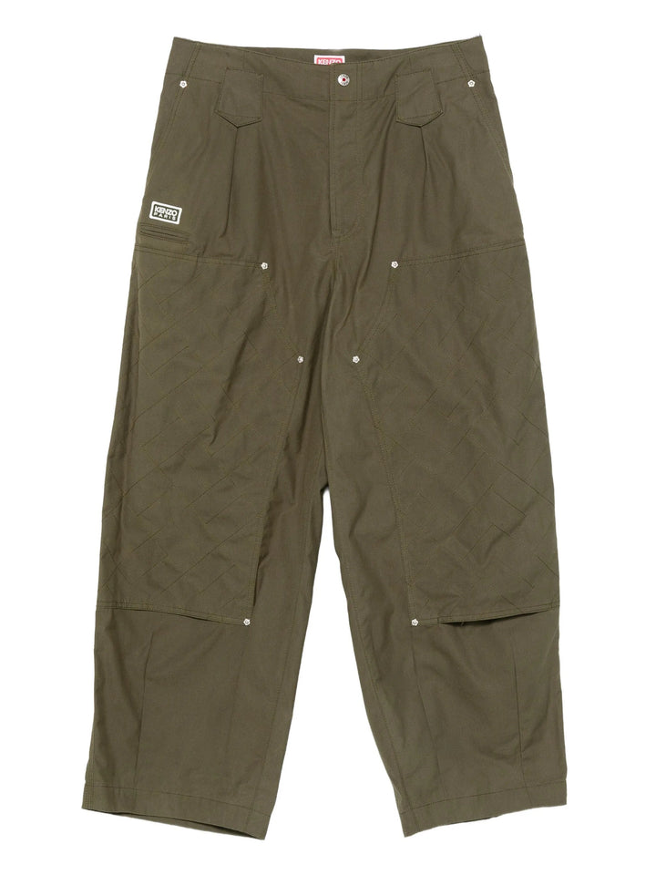 Kenzo Weave Double Knee Pants in olive green, featuring diamond weave stitching, flower rivet hardware, double-knee panels, and a woven Kenzo Paris logo patch