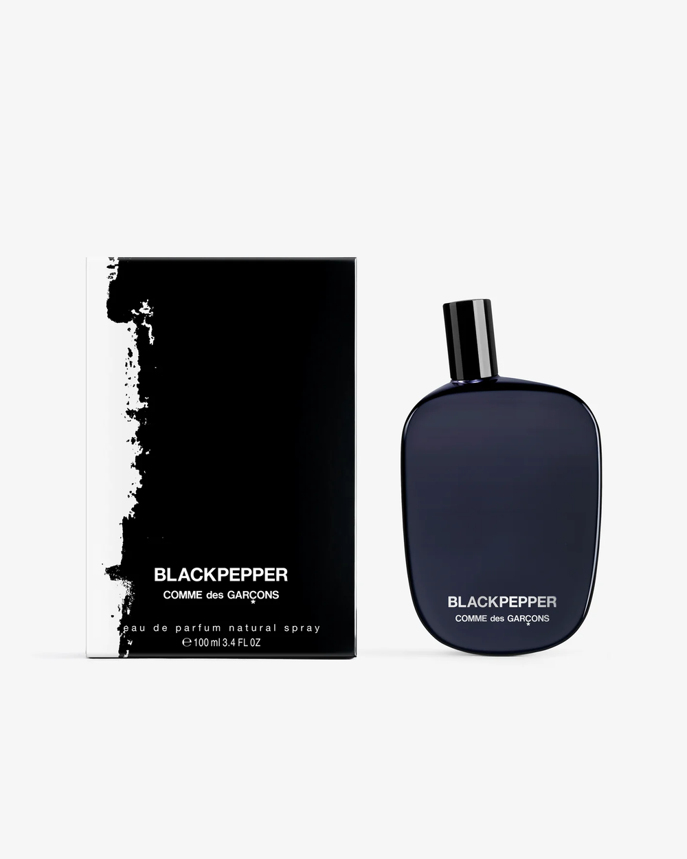 Comme des Garçons Parfums Black Pepper Eau de Parfum 100ml in deep navy flat-oval bottle with glossy black cap