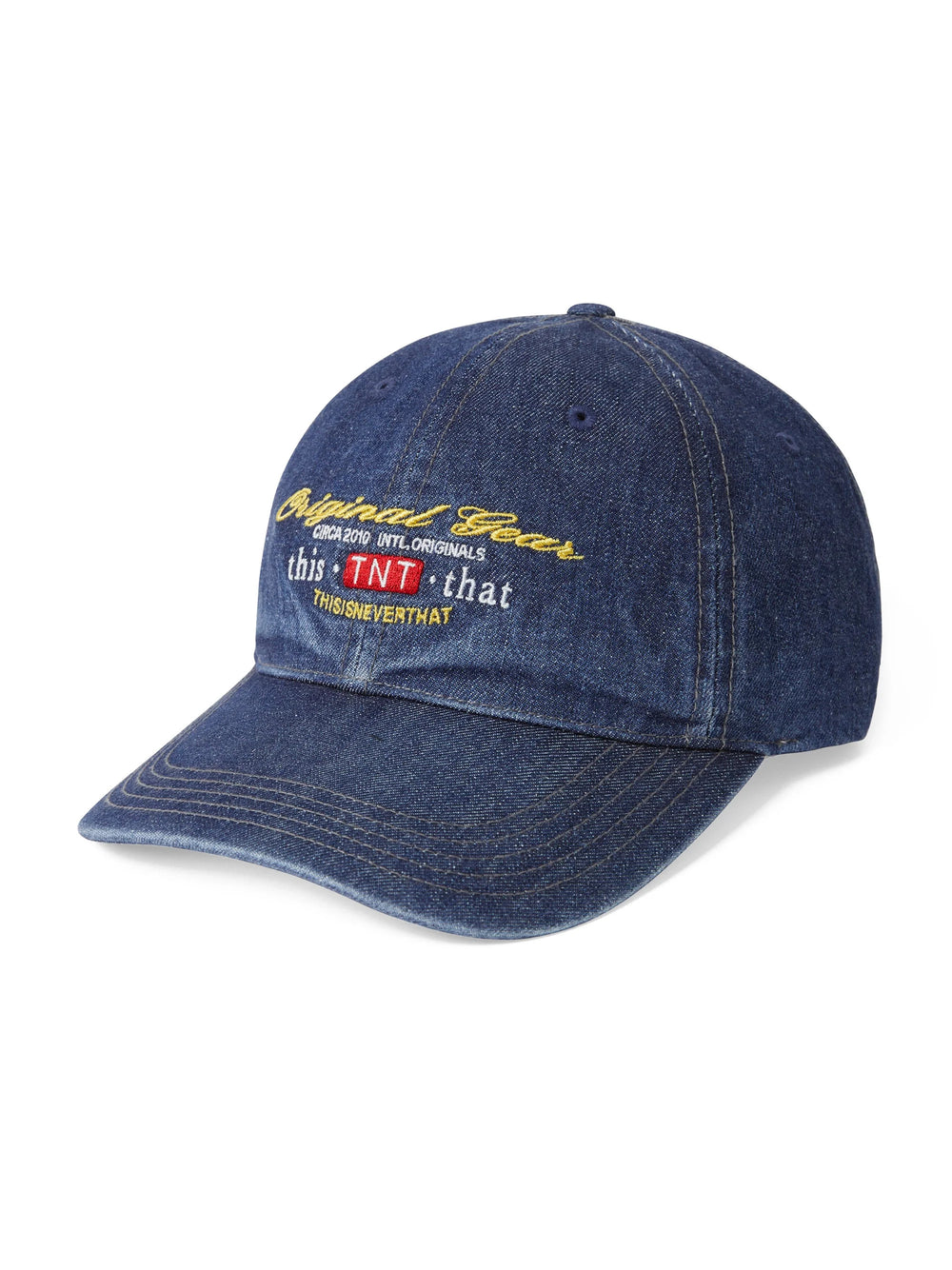 thisisneverthat Original Gear Denim Cap in washed indigo, featuring embroidered gold script, TNT badge, and six-panel construction, front view
