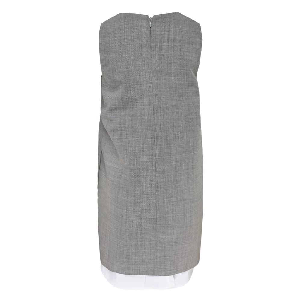 Alexander Wang grey woven sleeveless shift mini dress with smocked back neckline, zip hardware at hem, and layered white underlayer — rear view