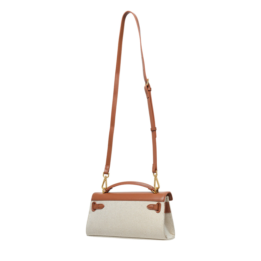 JW PEI Noor Top Handle Bag in beige canvas with tan leather trim, gold turnlock closure, top carry handle, and adjustable crossbody strap, photographed on a white background