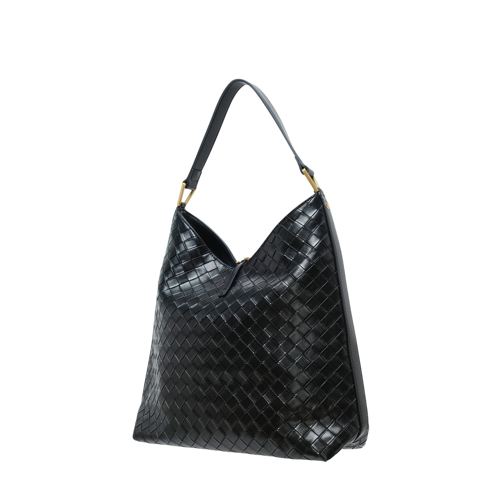 JW PEI Aria Woven Texture Shoulder Bag in black with intrecciato weave pattern, single flat strap, gold-tone hardware, and drawstring tassel closure