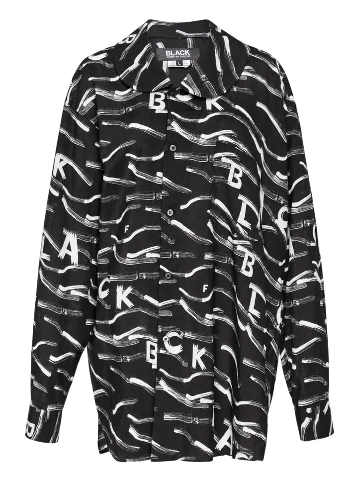 Comme des Garçons BLACK Filip Pagowski long sleeve oversized shirt in black polyester lawn with all-over white brushstroke and fragmented letter print