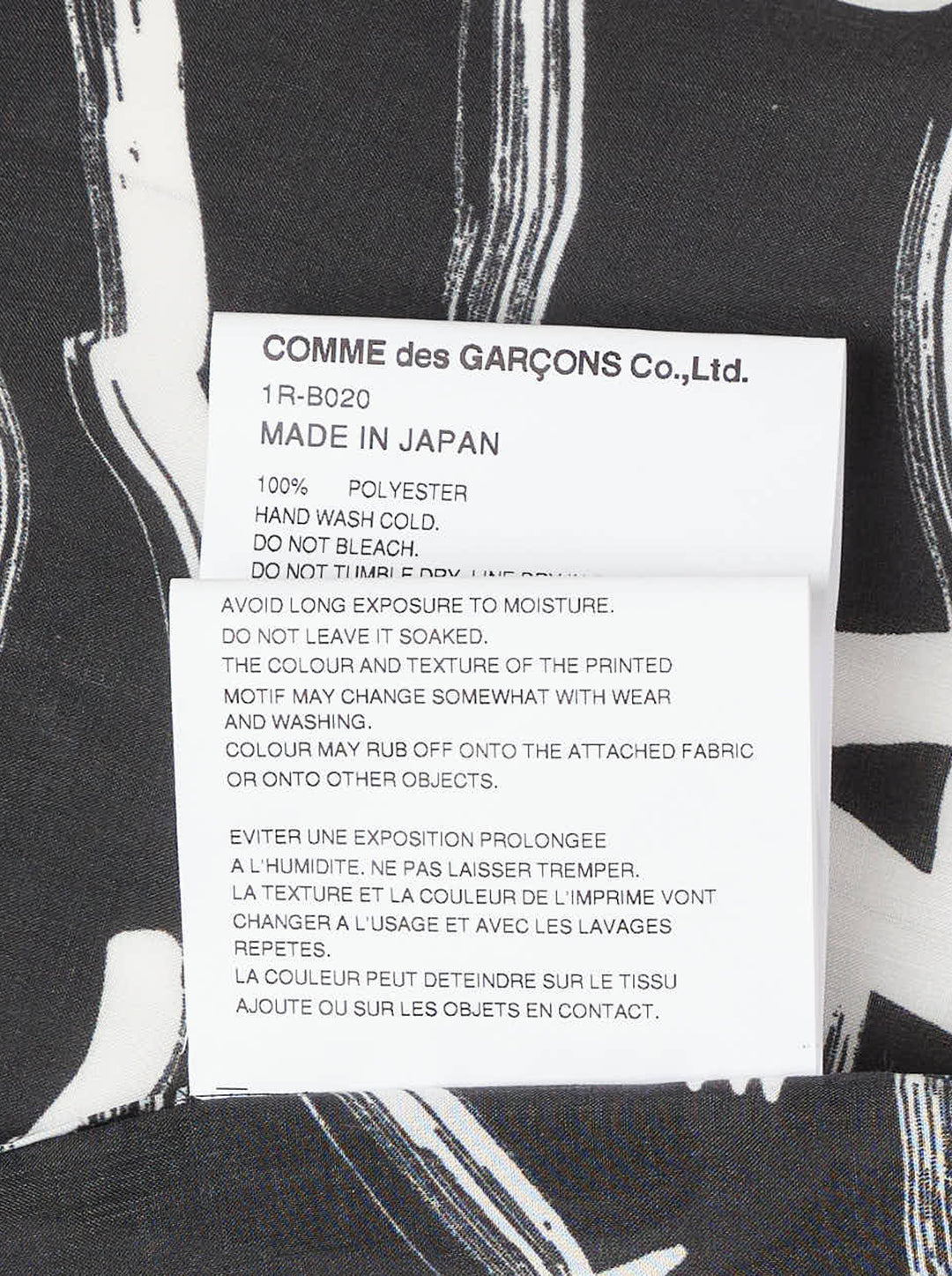Comme des Garçons BLACK Filip Pagowski long sleeve oversized shirt in black polyester lawn with all-over white brushstroke and fragmented letter print - view 4