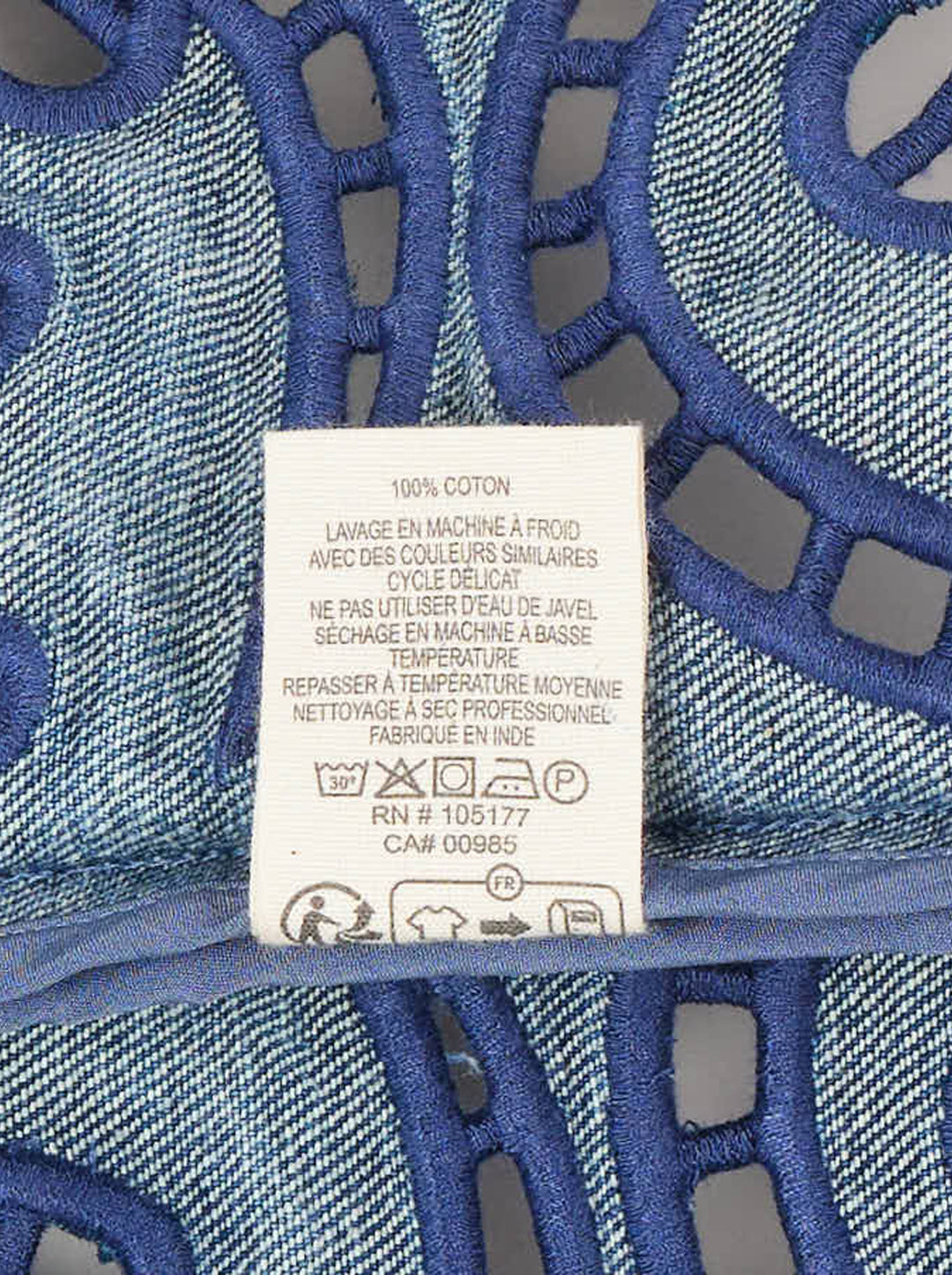 Ulla Johnson Jane Eyelet Denim Dress in washed blue denim with spaghetti straps, empire waist and indigo cutwork embroidery along the scalloped hem - view 4