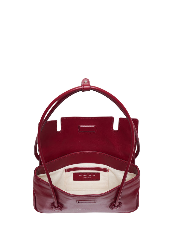 Marge Sherwood Flap Small shoulder bag in deep crimson glossy leather with elongated shoulder strap and dual ring loop hardware - view 3