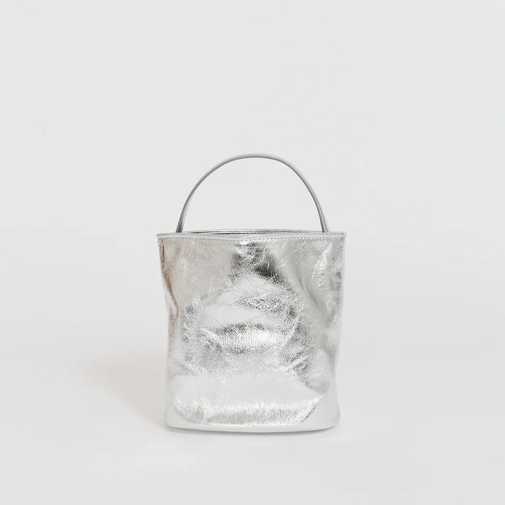 Marge Sherwood Wired Bucket Bag in crinkled metallic silver leather with a slim top handle and gold-tone charm on chain - view 3