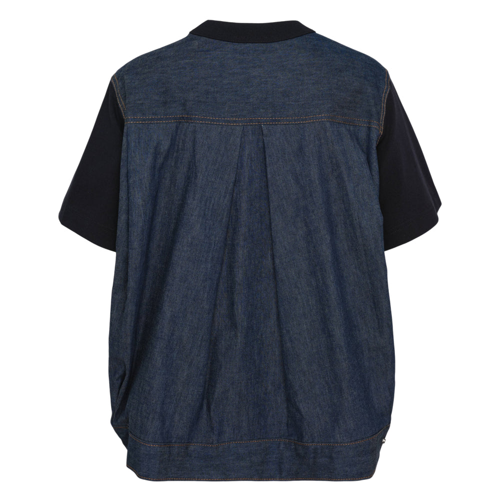 sacai Denim x Cotton Jersey T-Shirt in black and indigo, featuring panelled denim sides, a flared hem, ribbed crew neck, and a patch chest pocket
