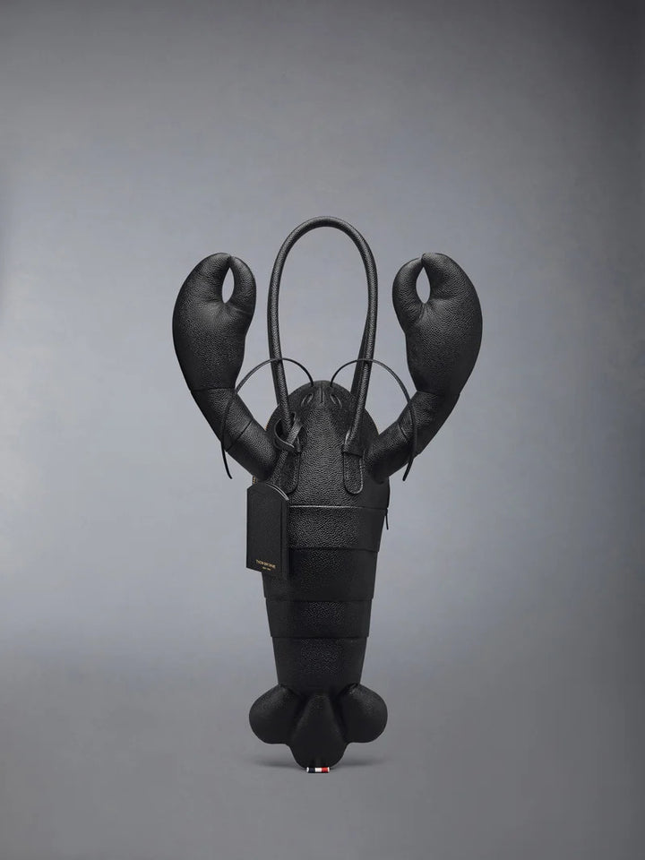 Thom Browne black pebble-grain leather lobster-shaped tote bag with raised claws, rolled handles and a luggage tag