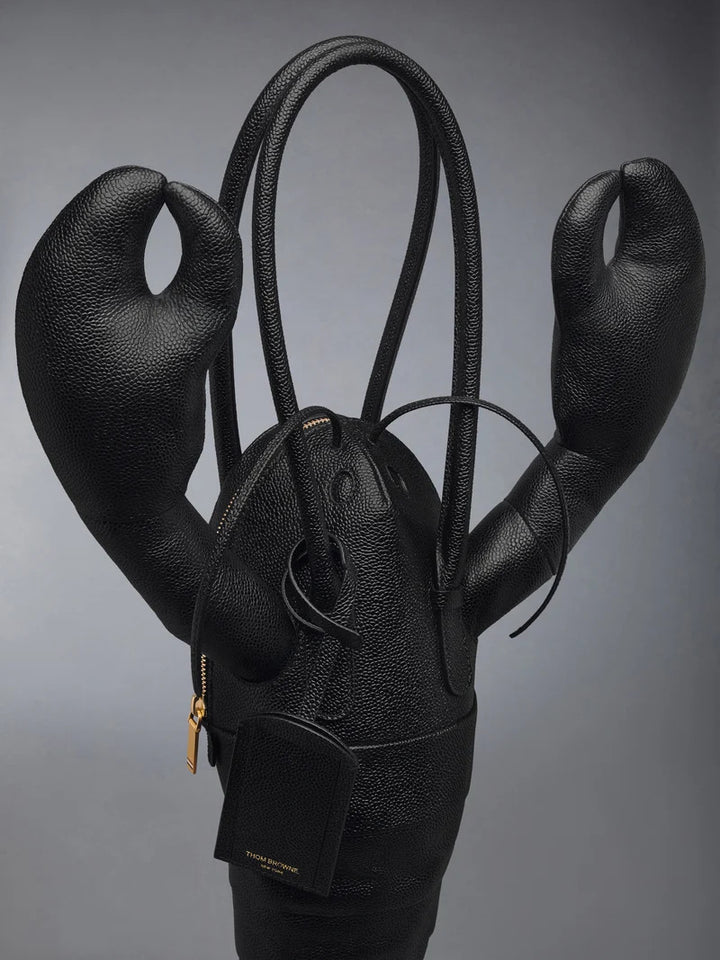 Thom Browne black pebble-grain leather lobster-shaped tote bag with raised claws, rolled handles and a luggage tag - view 5