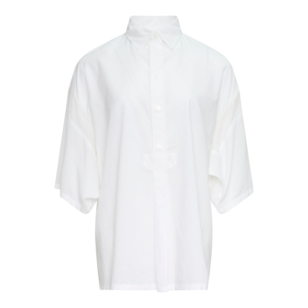 Y's oversized white half-sleeve blouse with dropped shoulders, wide billowing sleeves, point collar, and partial button placket, displayed on a plain white background