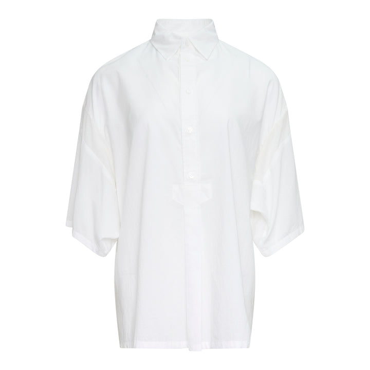 Y's oversized white half-sleeve blouse with dropped shoulders, wide billowing sleeves, point collar, and partial button placket, displayed on a plain white background