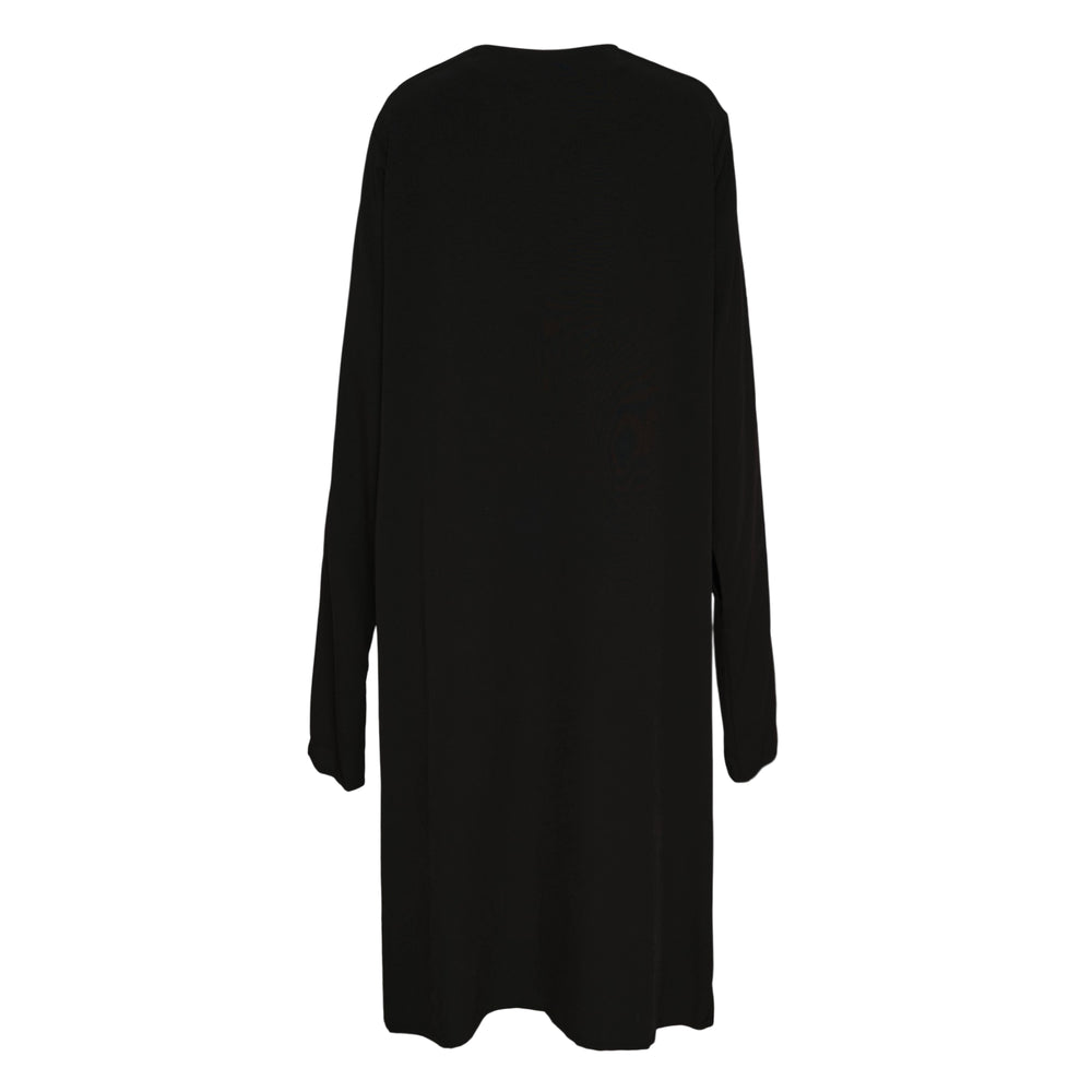 Y's Knot Sleeve Dress in black — oversized long-sleeve midi dress with a relaxed A-line silhouette and knotted sleeve detail, shown on a plain white background