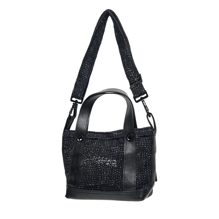 Y's x FAF 008 black kantha-stitched tote bag with pebbled leather trim, dual short handles, and a wide adjustable crossbody strap with gunmetal hardware - view 2