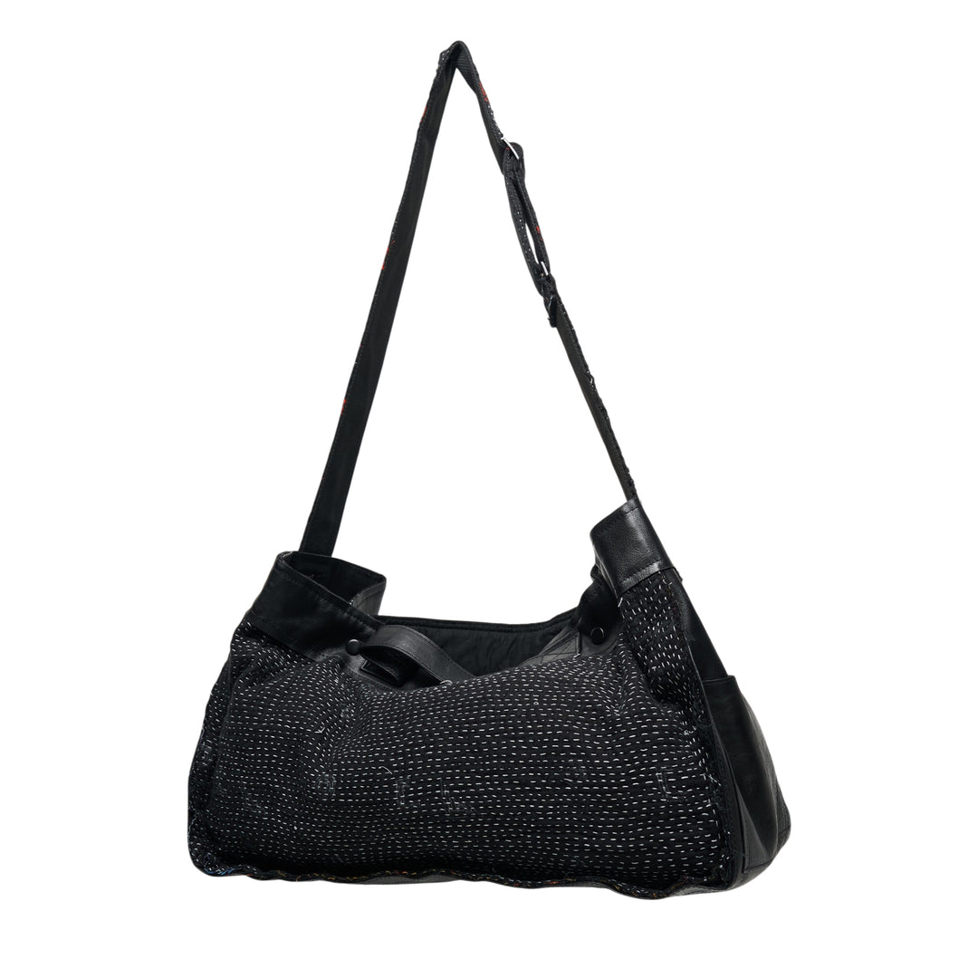 Y's x FAF 001 black shoulder bag with all-over running stitch quilted textile body, leather frame trim, adjustable strap with contrast red stitching, and drawstring corner closure - view 2