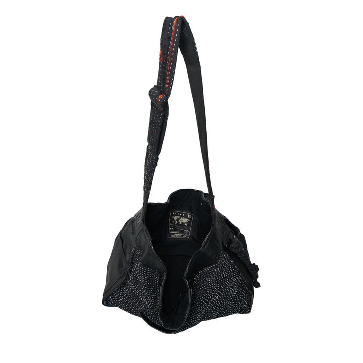 Y's x FAF 001 black shoulder bag with all-over running stitch quilted textile body, leather frame trim, adjustable strap with contrast red stitching, and drawstring corner closure - view 3