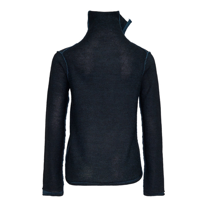 Y's high neck semi-sheer fine-knit top in deep navy with an asymmetric diagonal teal contrast cloth panel and raw-edge detailing, long sleeves, front view