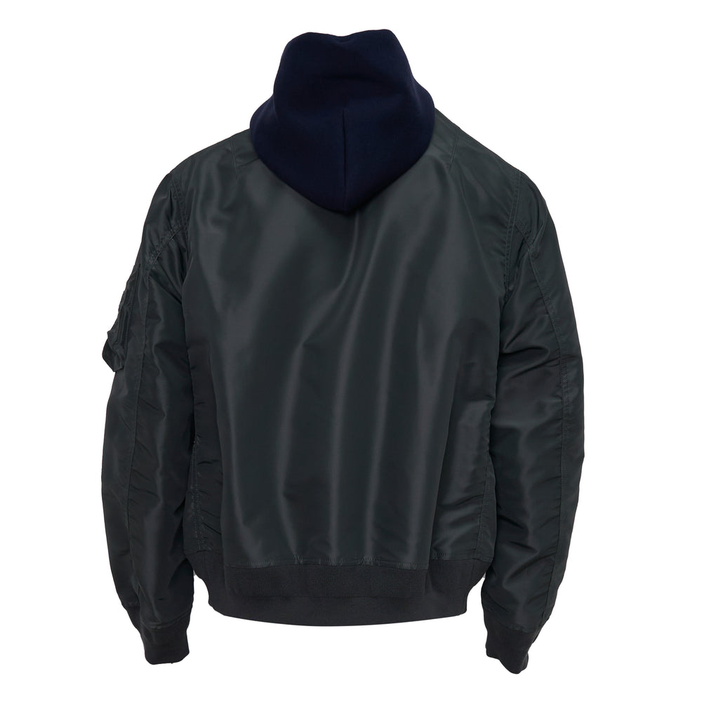 sacai Sponge Sweat Bomber Hoodie in navy fleece with contrast olive nylon sleeves, full-length silver zip, drawstring hood, and MA-1 sleeve pocket, shown front-facing on a white background - view 2
