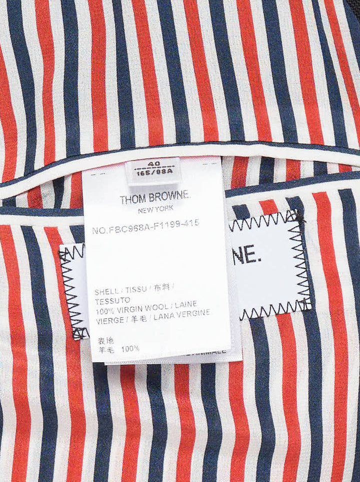 Thom Browne black V-neck cardigan jacket with gold-tone buttons, flap pockets and red, white and blue striped lining - view 5