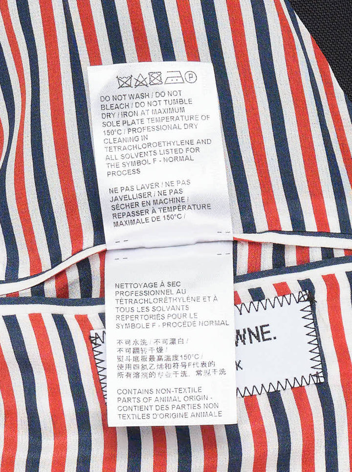 Thom Browne black V-neck cardigan jacket with gold-tone buttons, flap pockets and red, white and blue striped lining - view 6