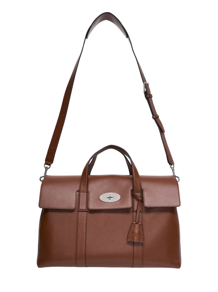 Mulberry Heritage Piccadilly Messenger in tan pebbled leather with silver-tone postman's lock closure, dual top handles, and adjustable crossbody strap