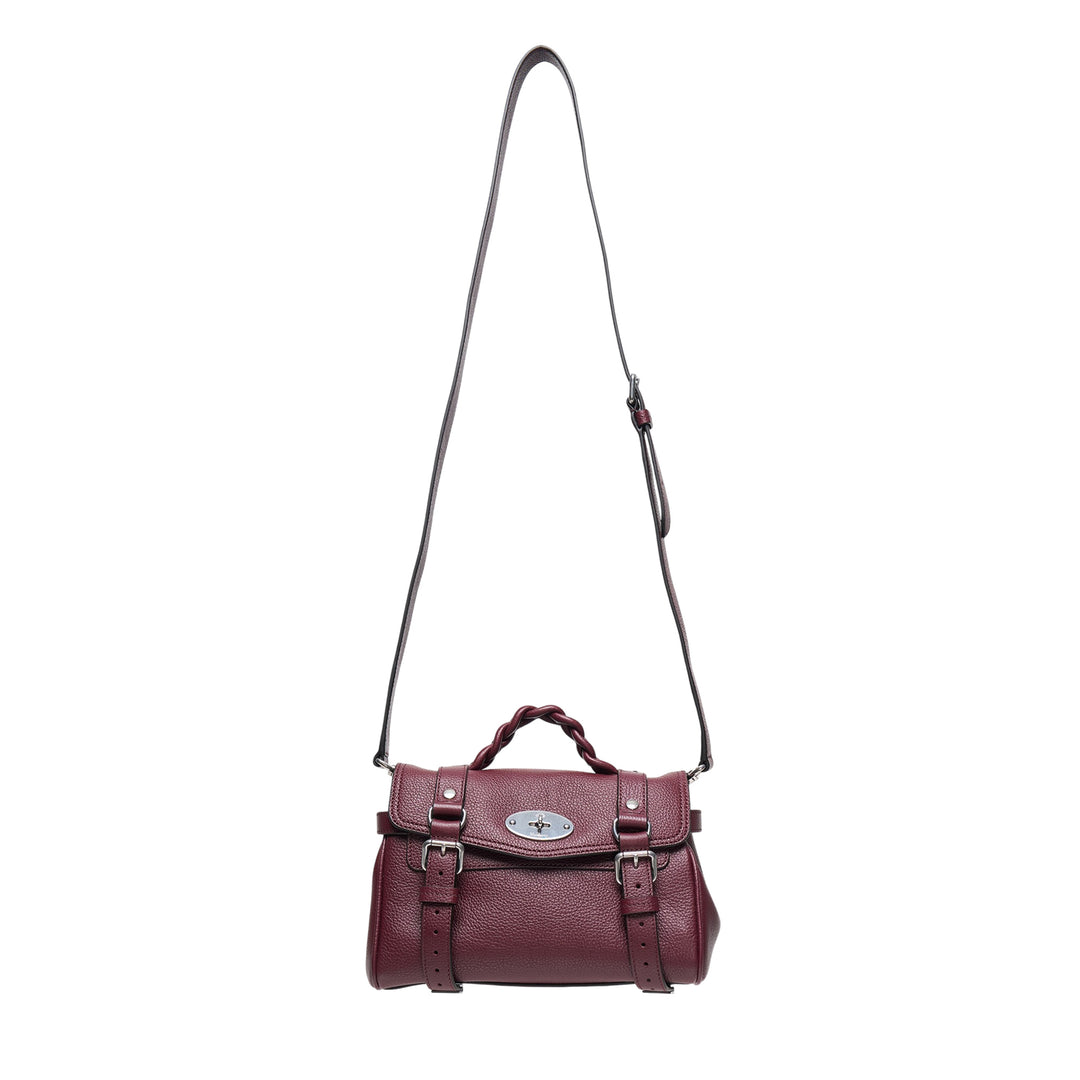 Mulberry Mini Alexa Small Classic Grain satchel in deep burgundy pebbled leather with braided top handle, silver-tone postman's lock, buckle strap detailing, and long adjustable crossbody strap