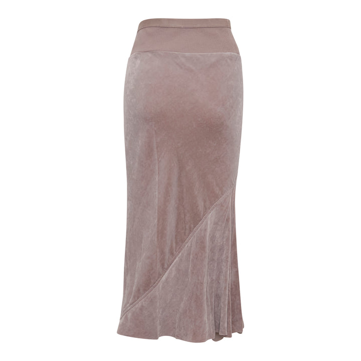 Rick Owens Knee Bias Velvet Skirt in dusty mauve, featuring a wide ribbed waistband, diagonal bias seam, and a fluid flared midi hem