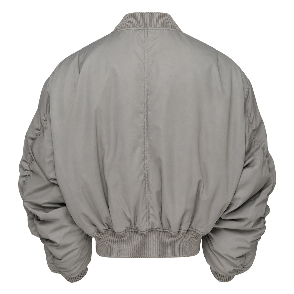 Rick Owens Secchia Flight Cotton Nylon Blouson in sage grey, featuring a cropped silhouette, ruched sleeves, ribbed trim, and silver zip closure, displayed flat on a white background