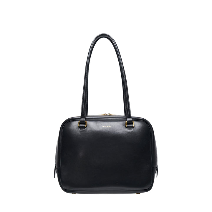 Jil Sander Vision Medium tote bag in black nappa lambskin leather with dual shoulder straps, gold-tone zip closure and D-ring hardware, front view on white background