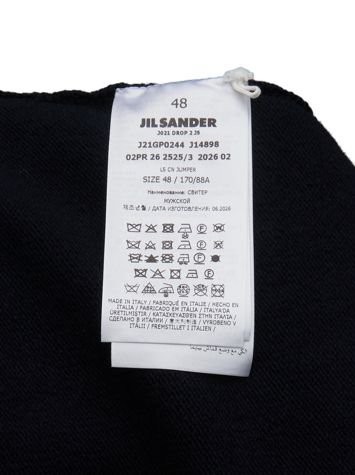 Jil Sander navy long sleeve structured knit jumper with tonal panelling and ribbed crewneck, cuffs, and hem, displayed flat on white background - view 3