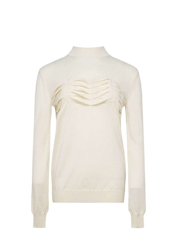 Jil Sander ivory long sleeve mock-neck cashmere jumper with sculptural chevron pleated chest detail, displayed flat on white background